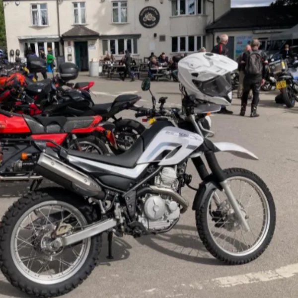 Phil And His Serow Visiting Squires Coffee Bar On Their Way Home From Our Office