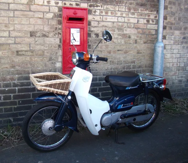 Here is Mr Bink's C50, the bespoke front basket is very practical for every day use. Looks excellent.