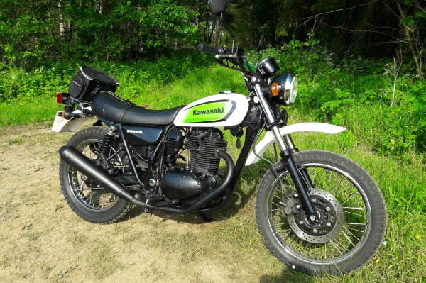Andrew's 250TR, blending in with the vegetation